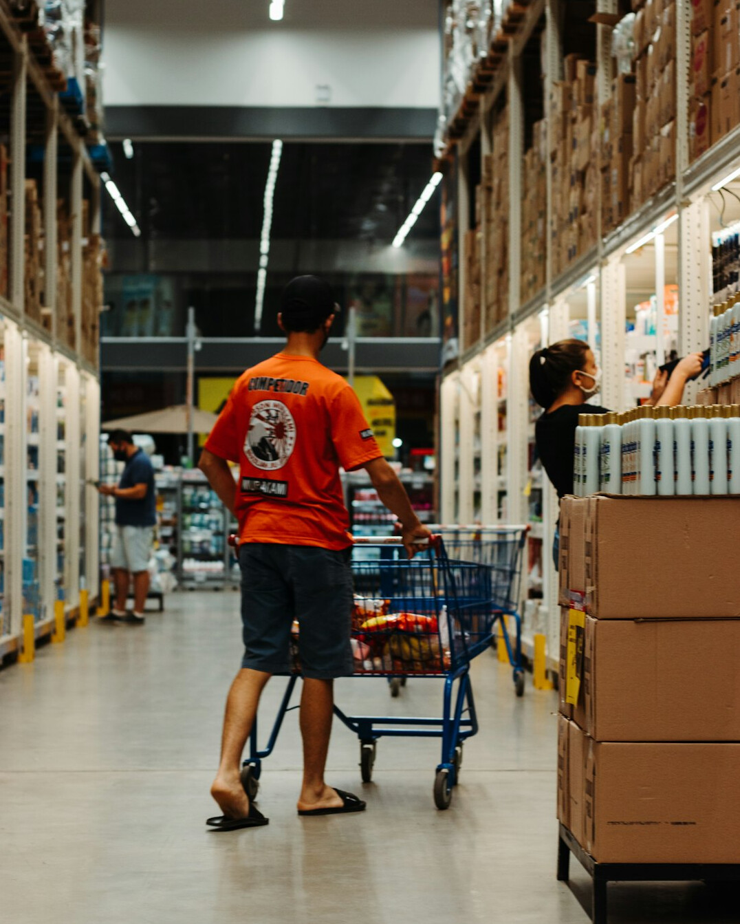 store detective monitoring aisle